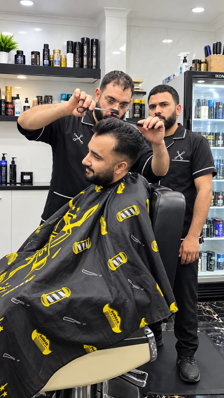Barber cutting a client's hair